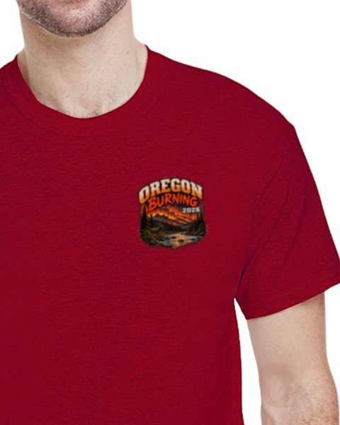 A man wearing a heathered red crewneck t-shirt with a 'OREGON BURNING 2026' graphic printed on the left chest.